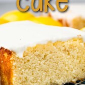 Lemon pound cake topped with glaze on a metal wire rack with recipe title on top of image