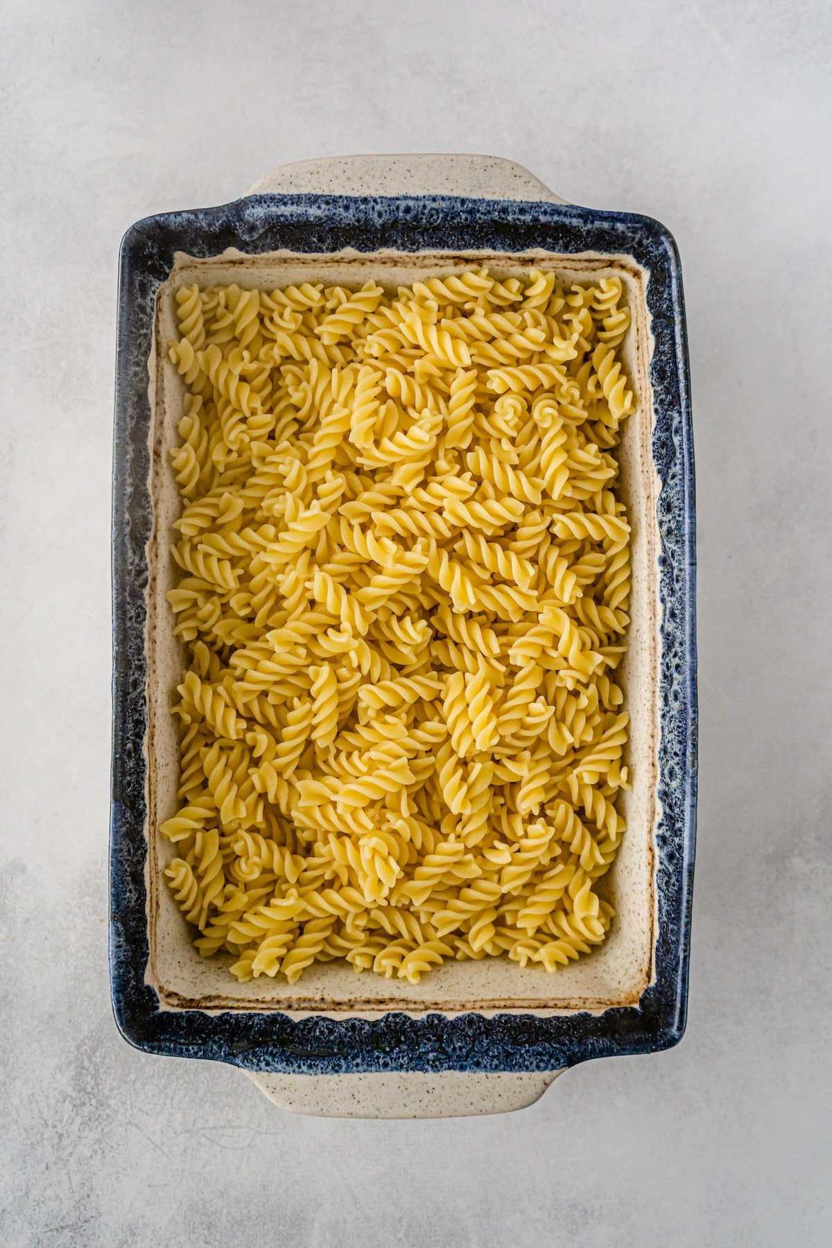 cooked pasta in casserole dish.