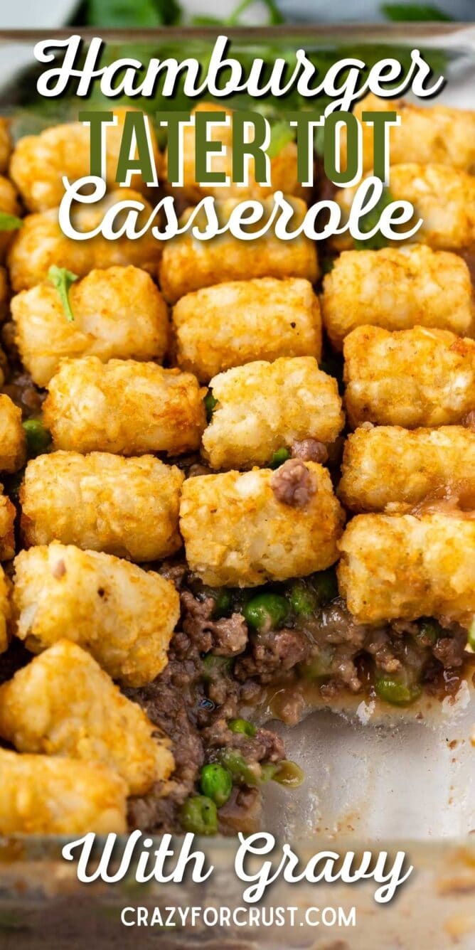 Hamburger tater tot casserole with corner piece missing and recipe title on top of image