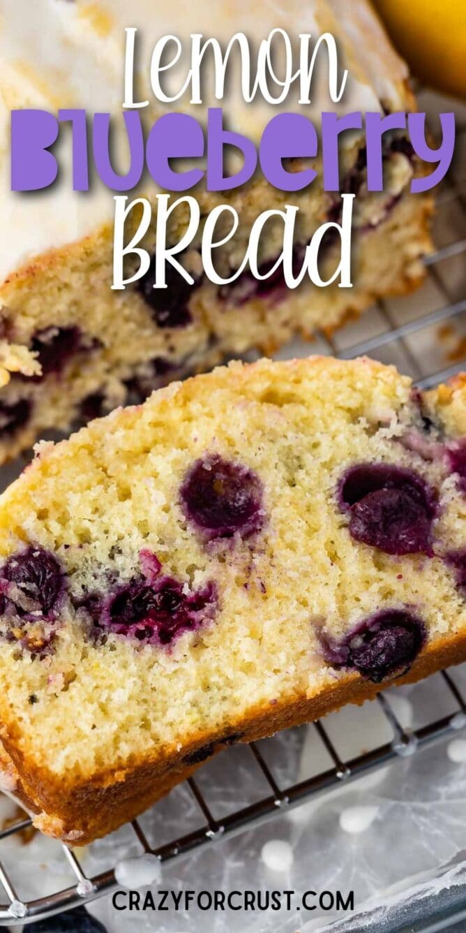 Overhead shot of lemon blueberry bread slice on wire rack with recipe title on top of image