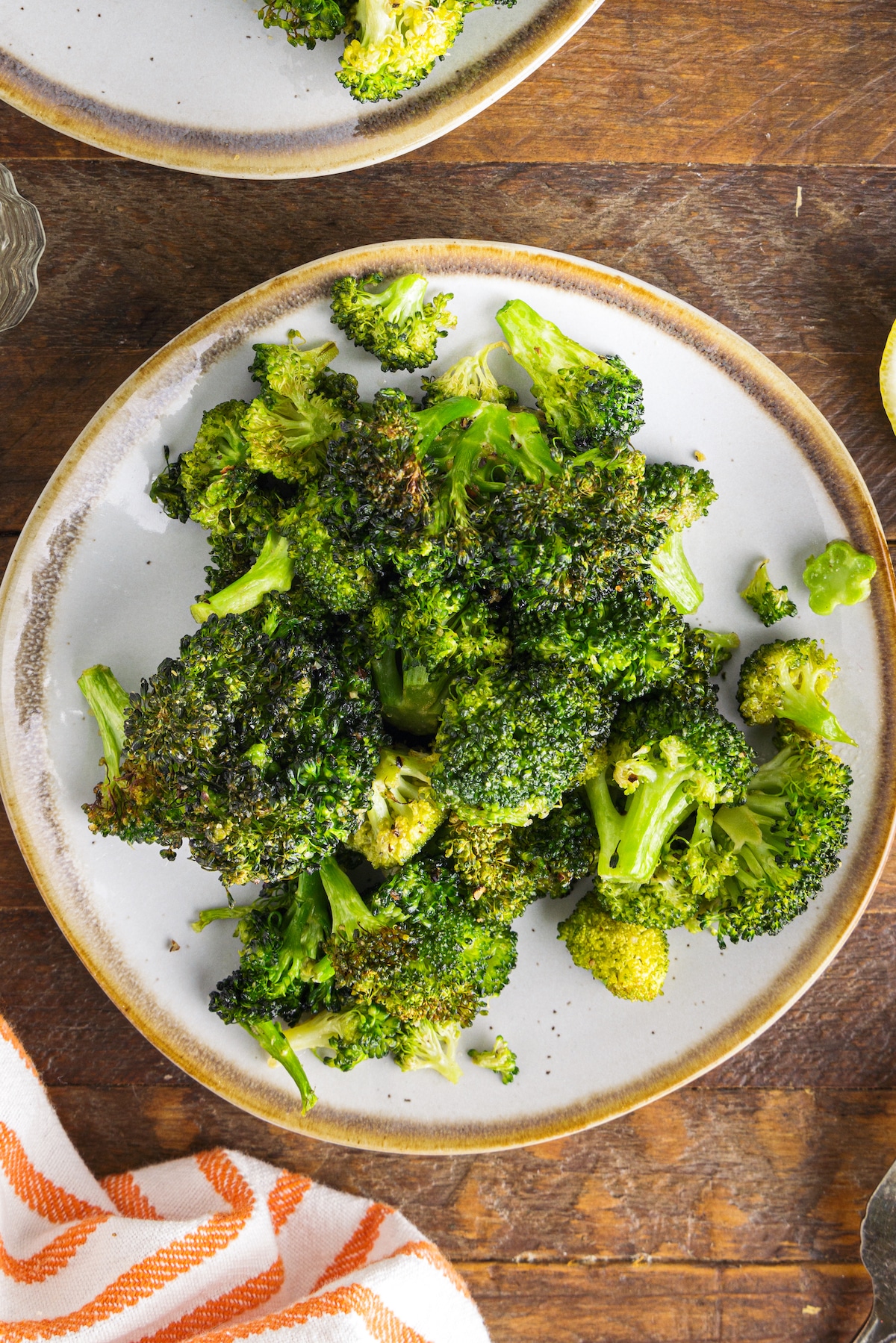 Overhead shot of air fryer broccoli on a plate
