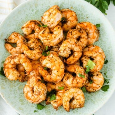 Overhead shot of plate full of air fryer shrimp