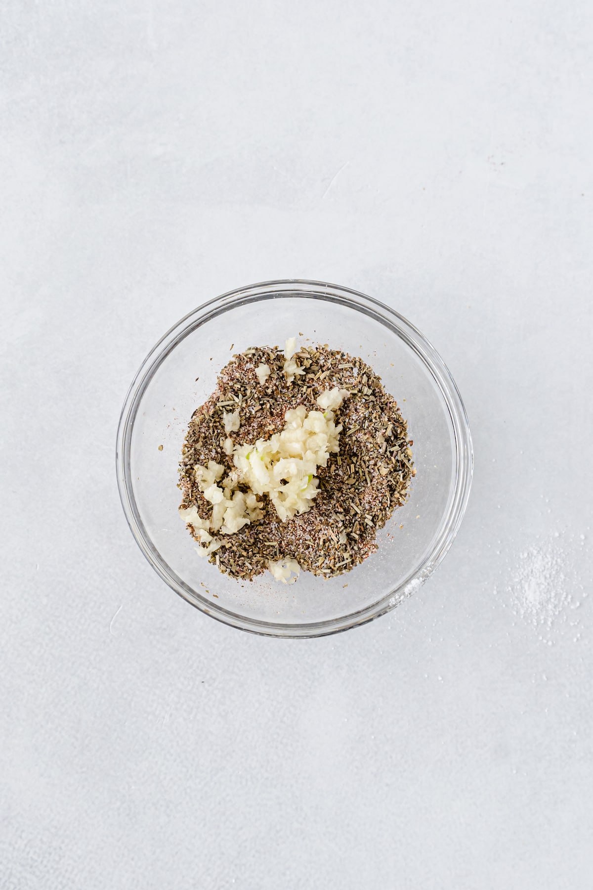 Overhead shot of spices and garlic for air fryer shrimp