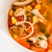 Close up overhead shot of bbq chicken soup in a bowl