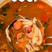 Overhead shot of ladle scooping up bbq chicken soup from the soup pot with recipe title on top of image