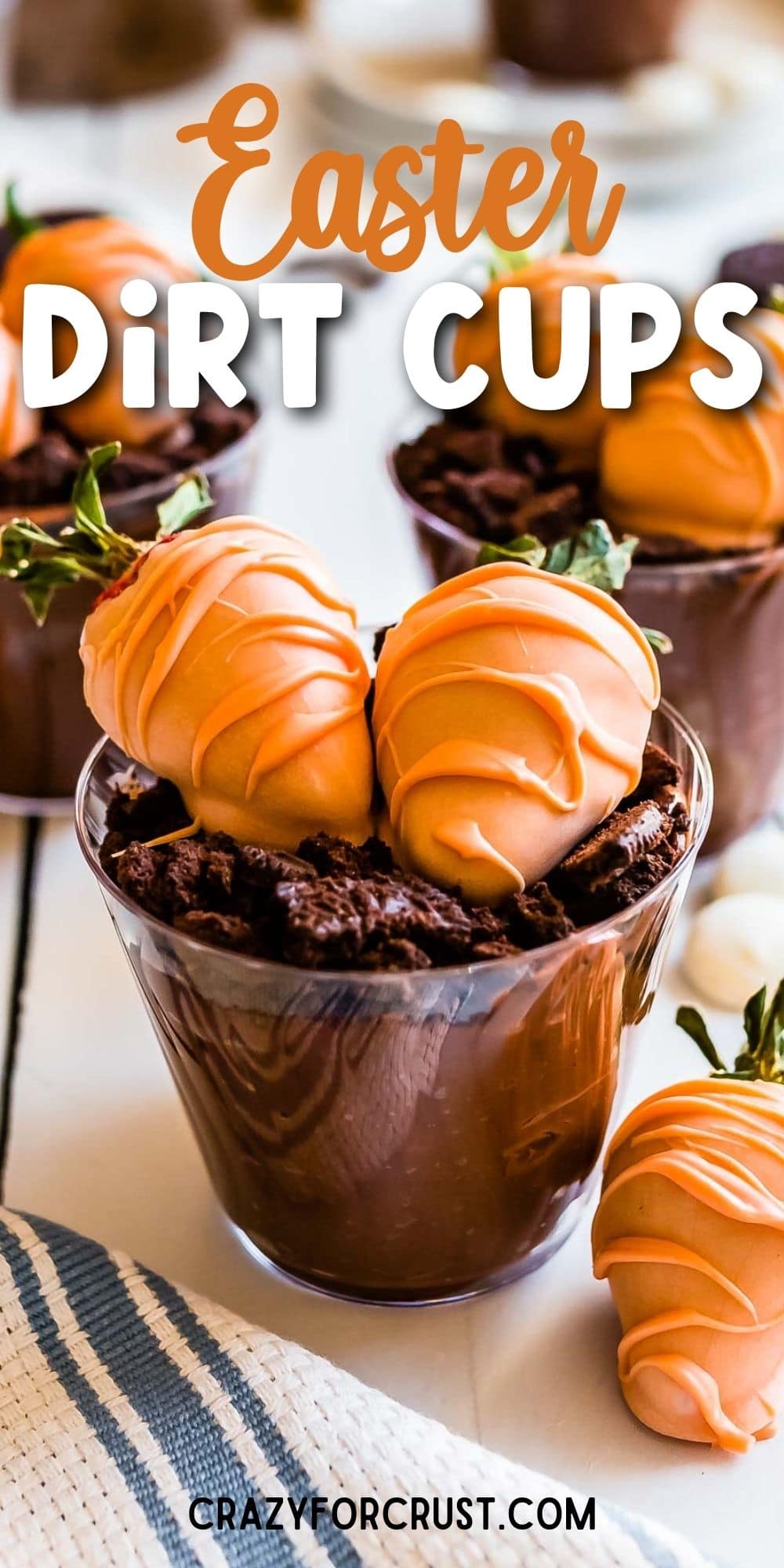 Easter dirt cups with chocolate covered strawberries on top with recipe title on top of image