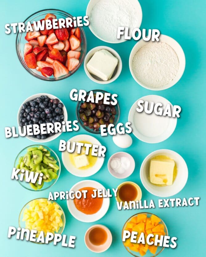 ingredients in fruit pizza on blue background