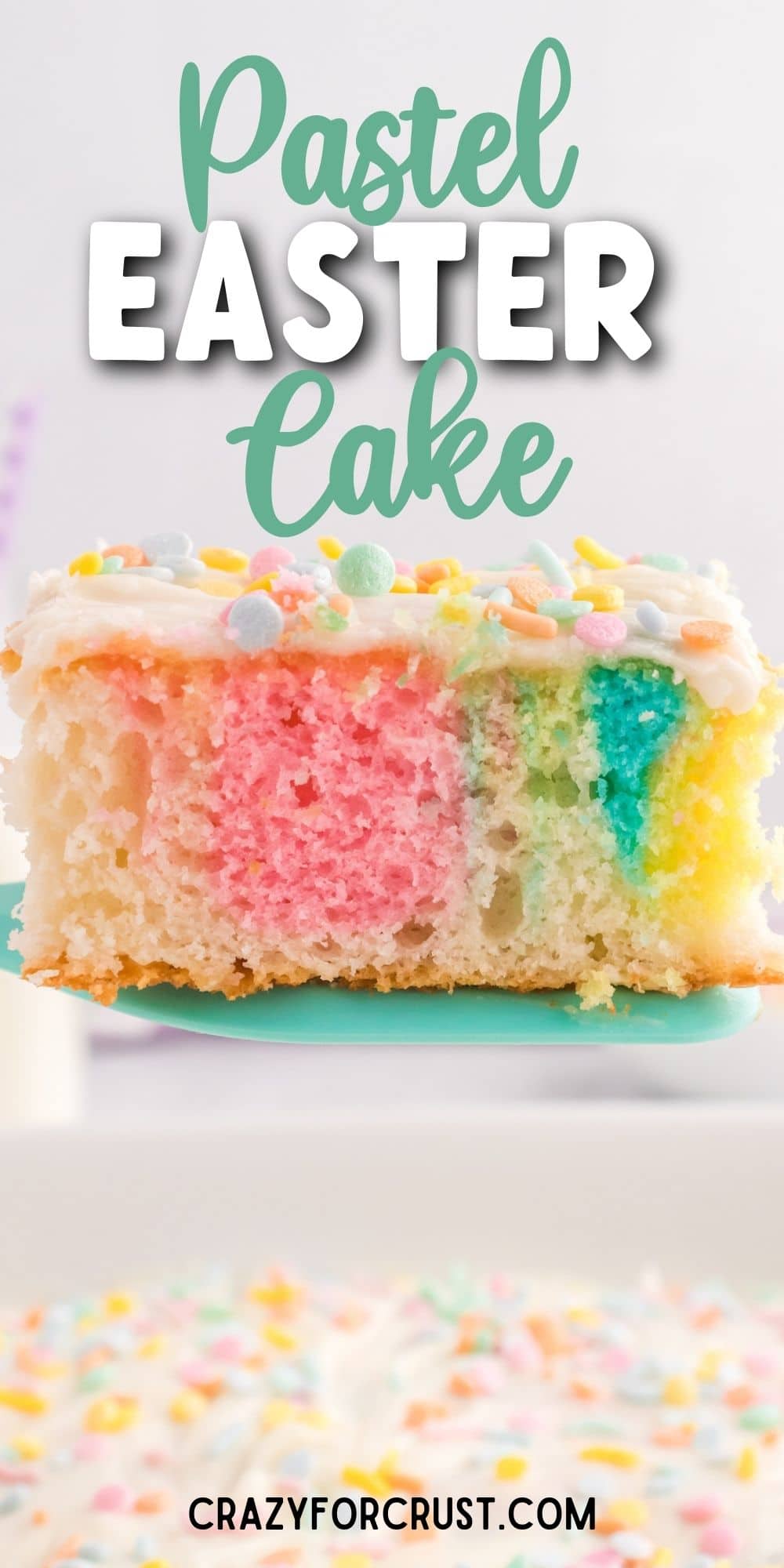 slice of tie dye easter cake on spatula with words on photo