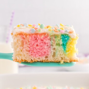 slice of tie dye easter cake on spatula