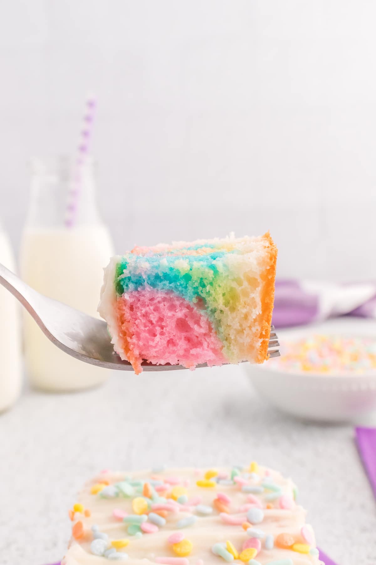 bite of tie dye easter cake on fork