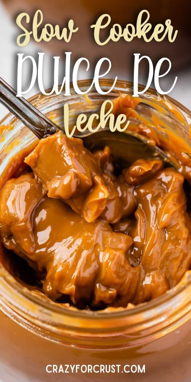 Close up shot of dulce de leche in jar with recipe title on top of image