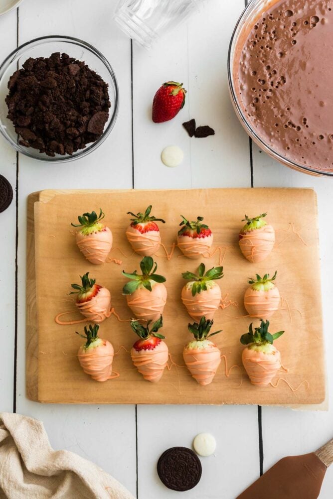 https://www.crazyforcrust.com/wp-content/uploads/2022/03/easter-dirt-cups-carrot-strawberries-3-668x1002.jpg