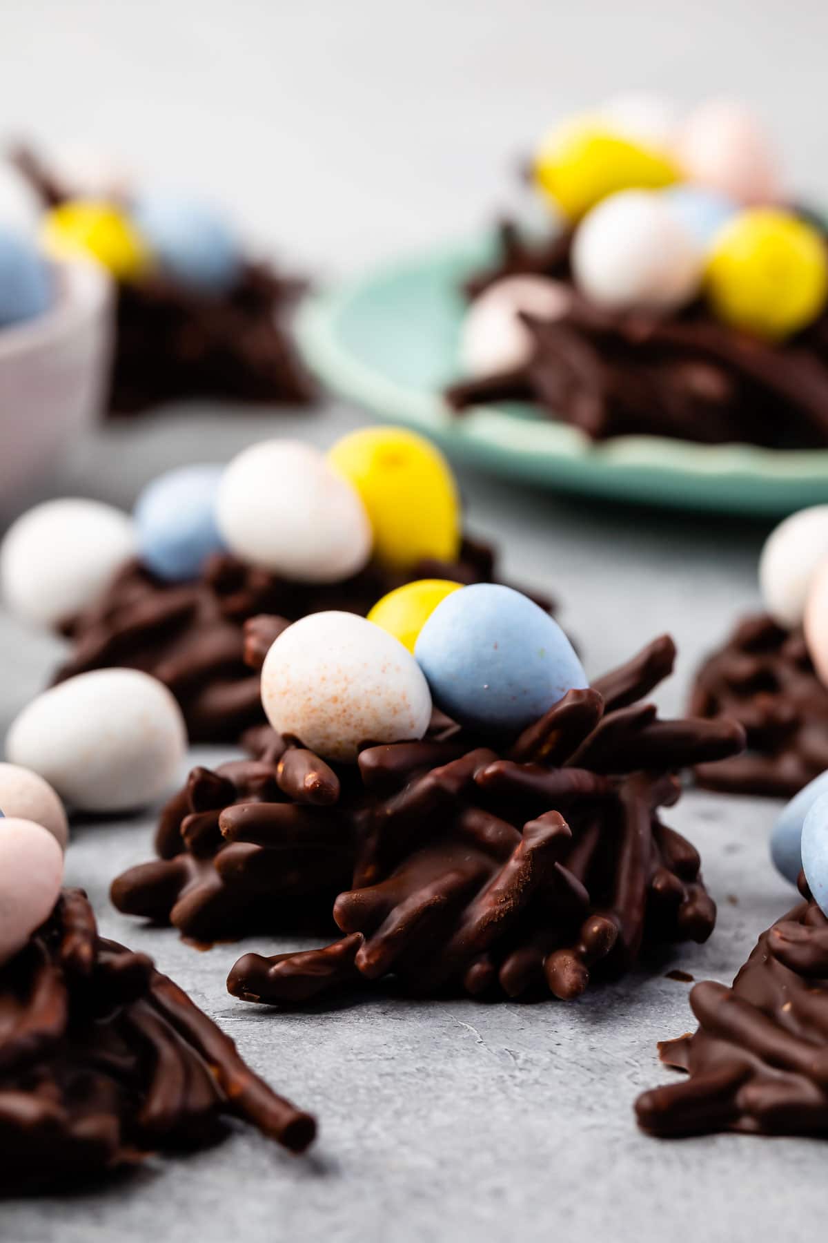 Side shot of easter nest cookies topped with egg candies