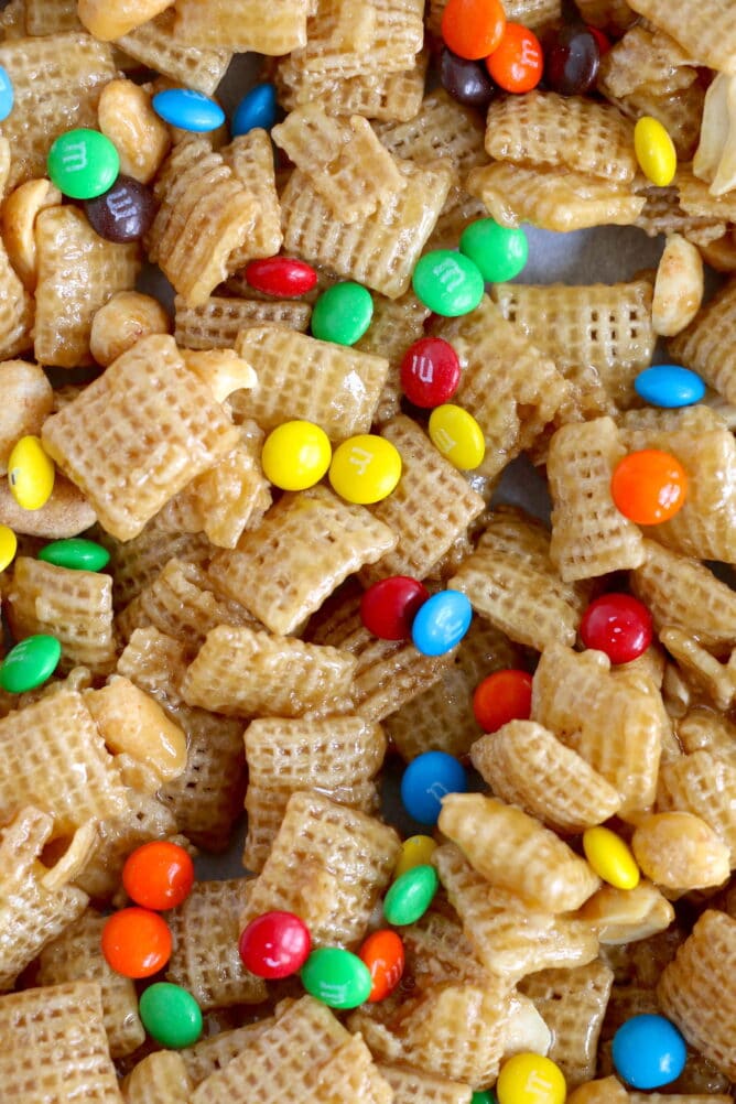 Overhead shot of caramel chex mix with m&ms mixed in