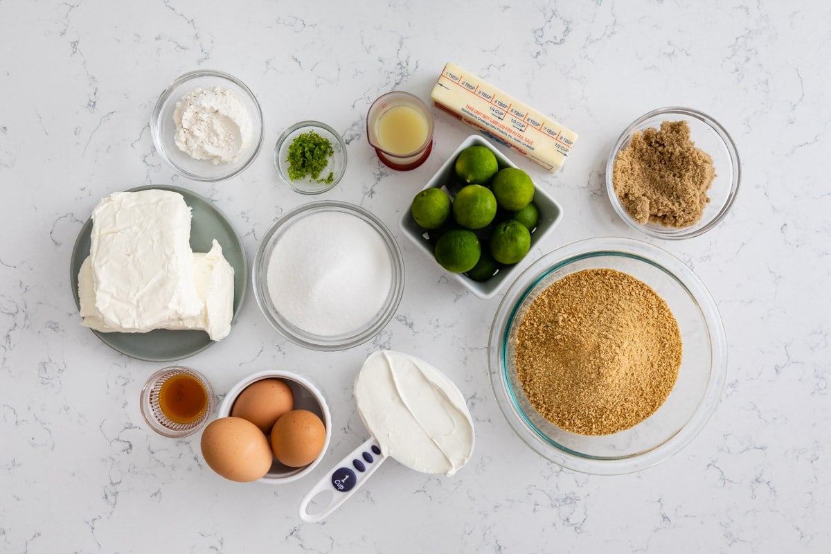 ingredients in key lime cheesecake on counter.