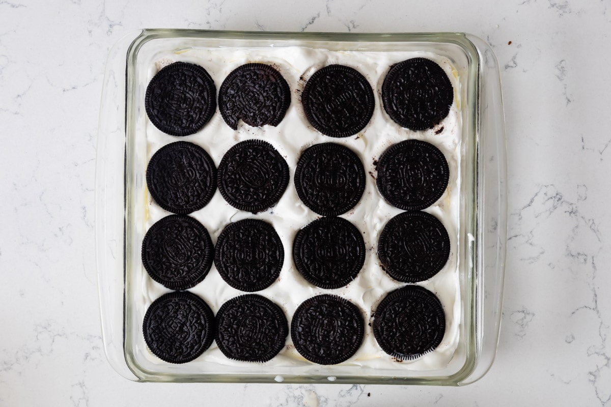 Overhead shot of Oreos layered in baking dish