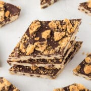 Overhead shot of cookie bark pieces with three stacked on eachother