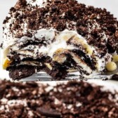 One big scoop of Oreo Lasagna being lifted out of the pan with recipe title on top of image