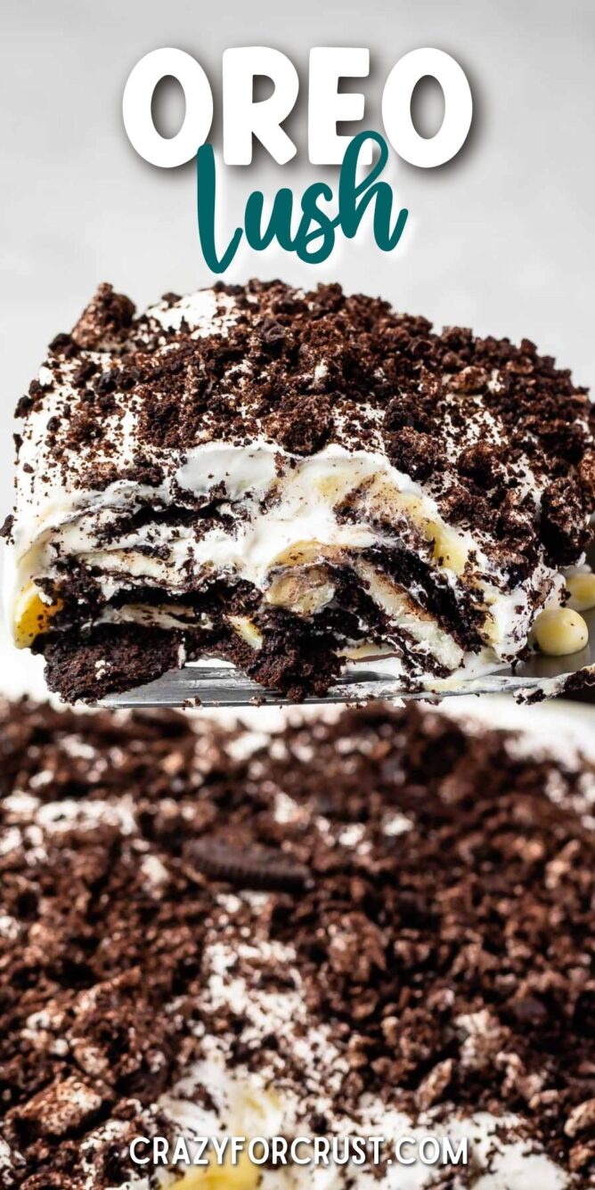 One big scoop of Oreo Lasagna being lifted out of the pan with recipe title on top of image