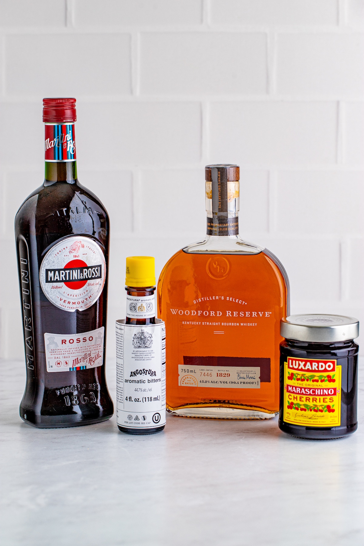 The four ingredients needed to make a Manhattan cocktail