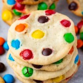 M&M cookies stacked on top of eachother