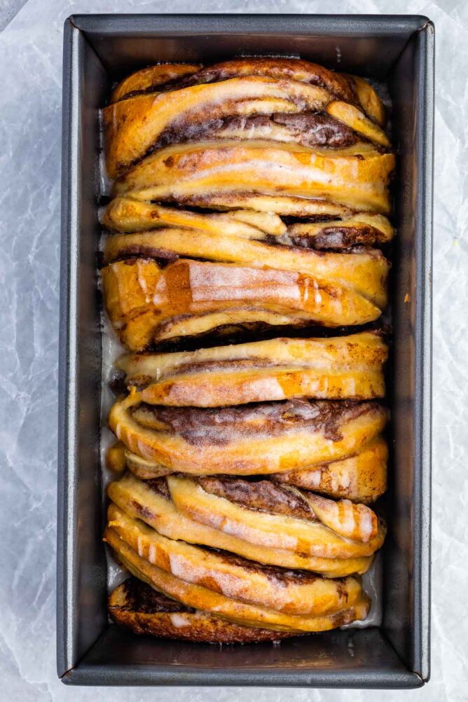 Overhead shot of chocolate cinnamon roll pull apart bread in the loaf pan