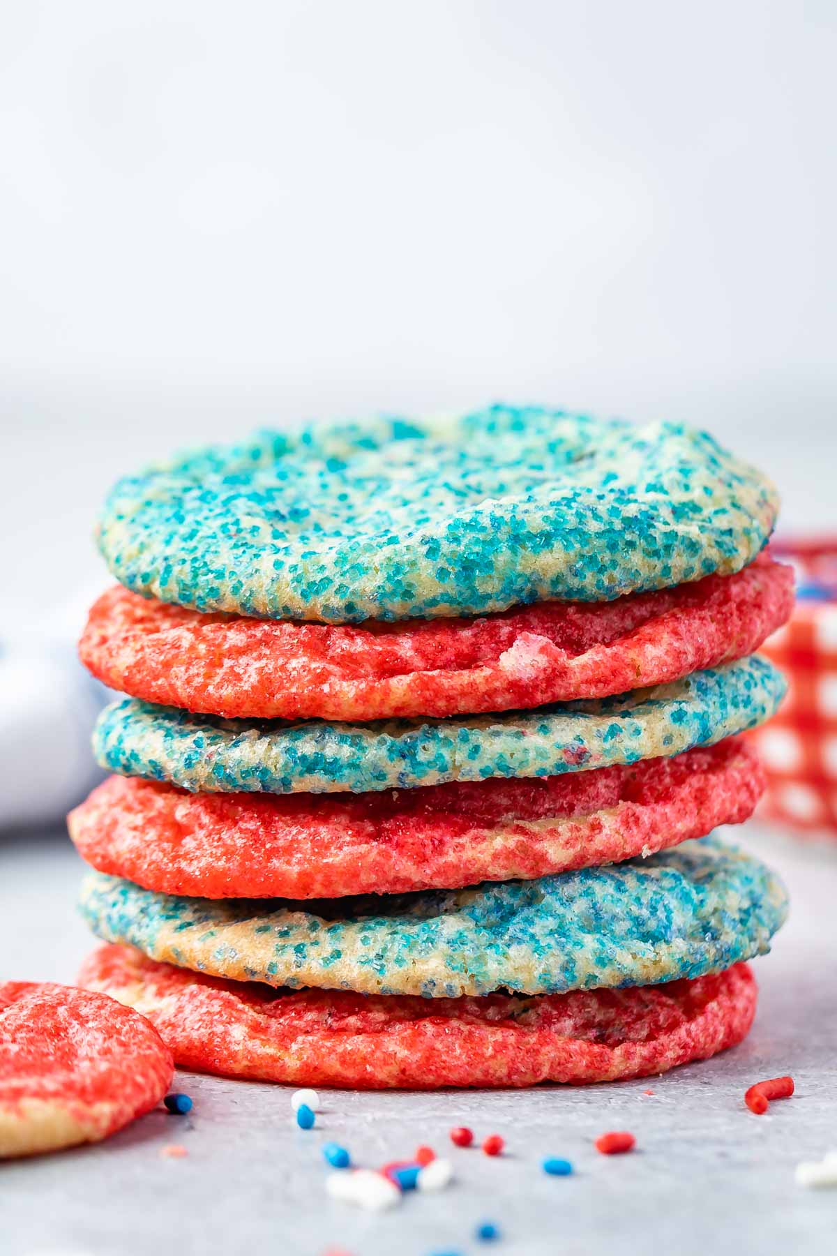 Stack of 6 sugar cookies alternating blue and red