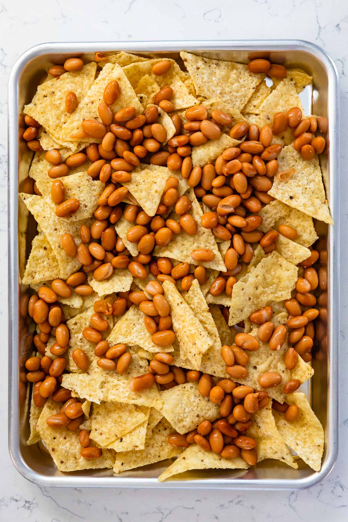 tray with chips and pinto beans.