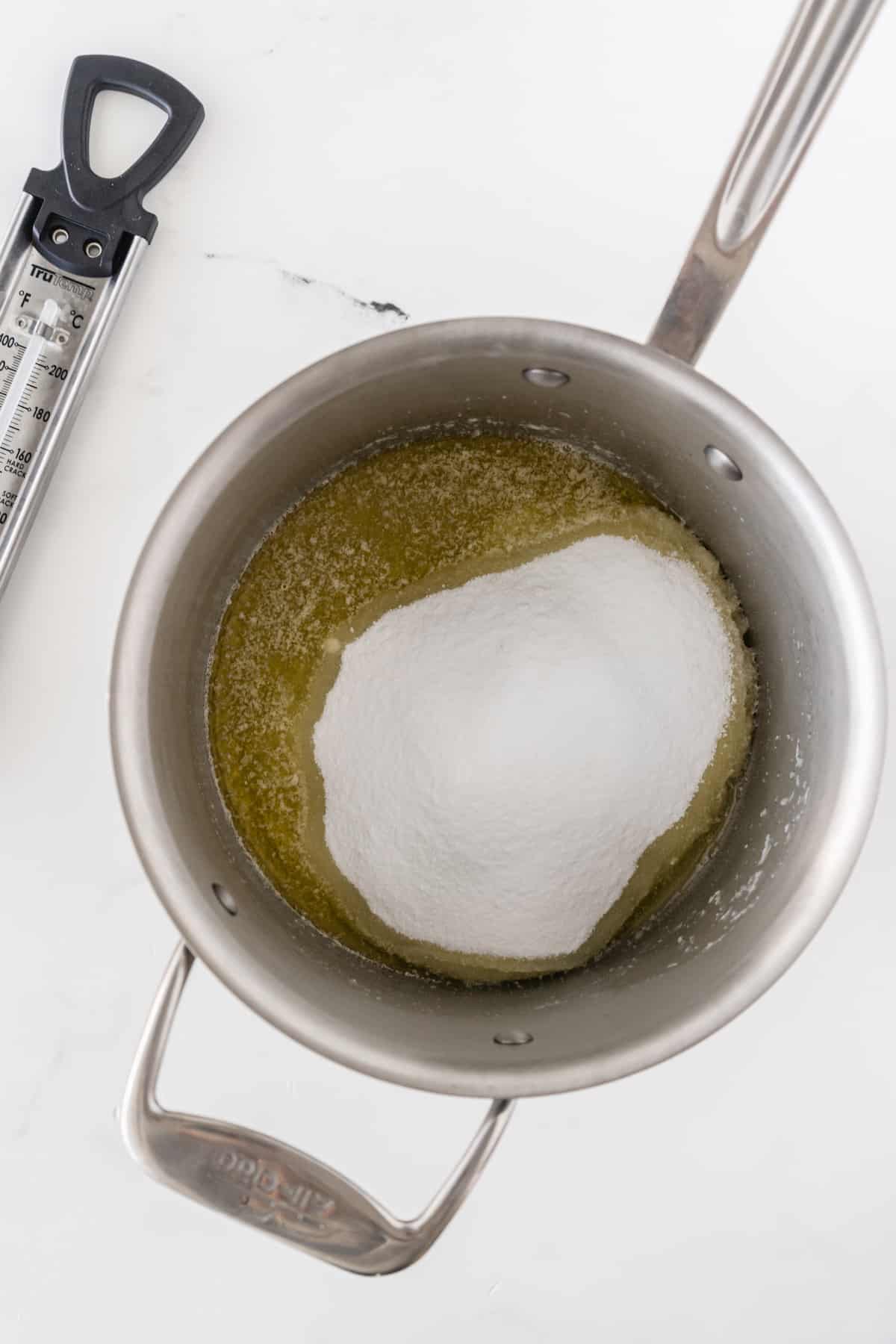 melted butter in saucepan with sugar