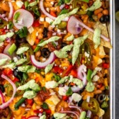 sheet pan nachos with words on photo