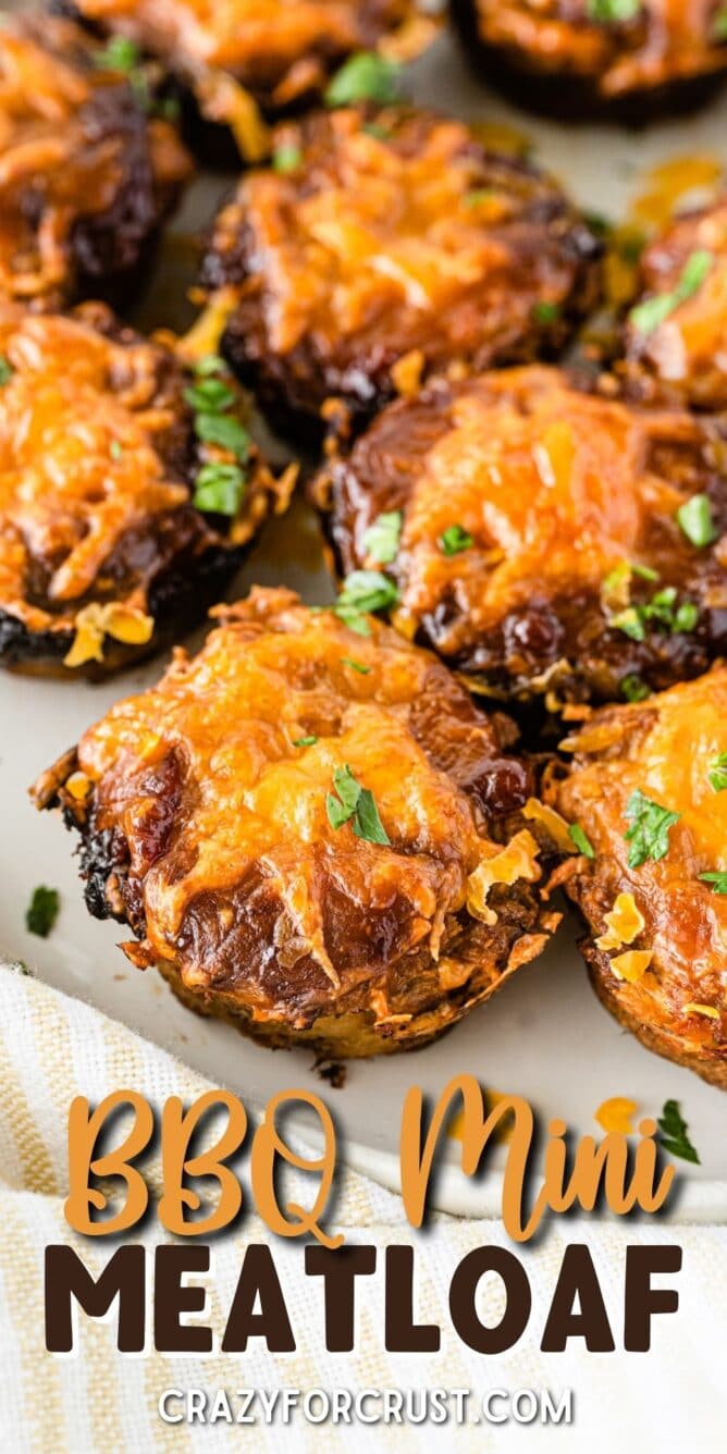 Mini BBQ meatloaves topped with cheese on a plate with recipe title on bottom of photo