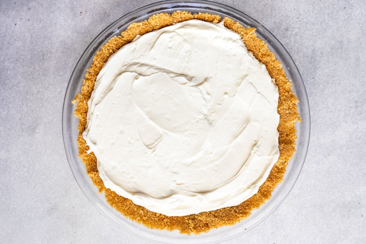 Overhead shot of blueberry cream cheese pie without topping