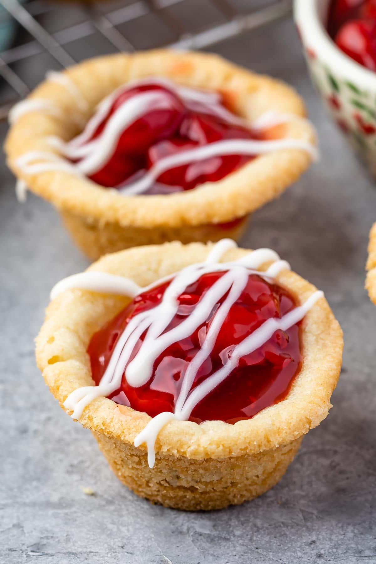 Close up shot of two cherry pie cups