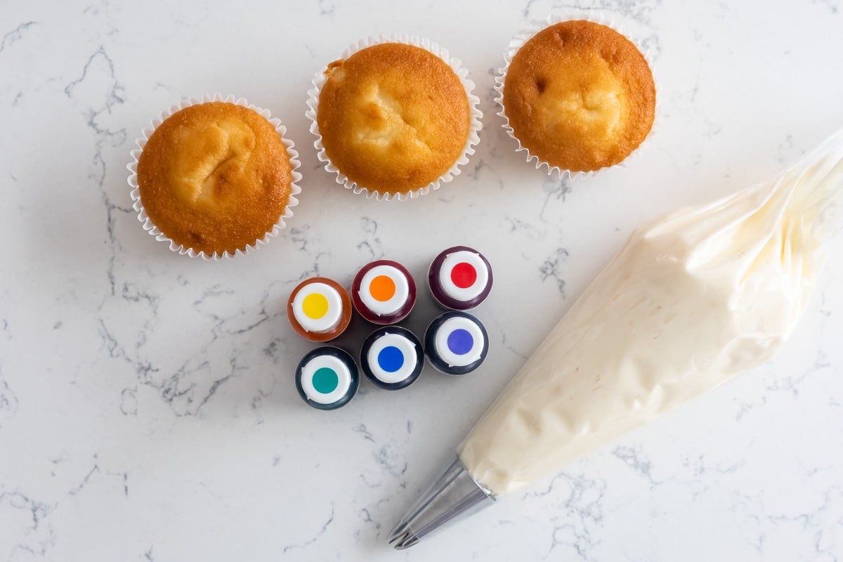 Overhead shot of all ingredients needed to make rainbow swirl frosting