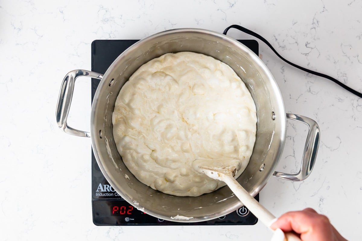 melted butter and marshmallows in large pot on hot plate.