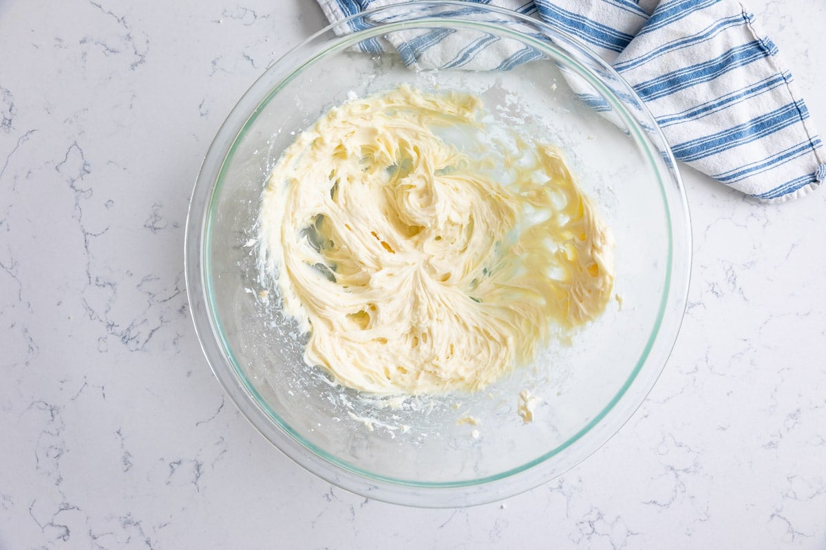 cream cheese beaten with sugar in bowl.