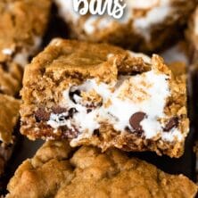 Oatmeal cookie s'mores bars cut into squares with recipe title on top of image