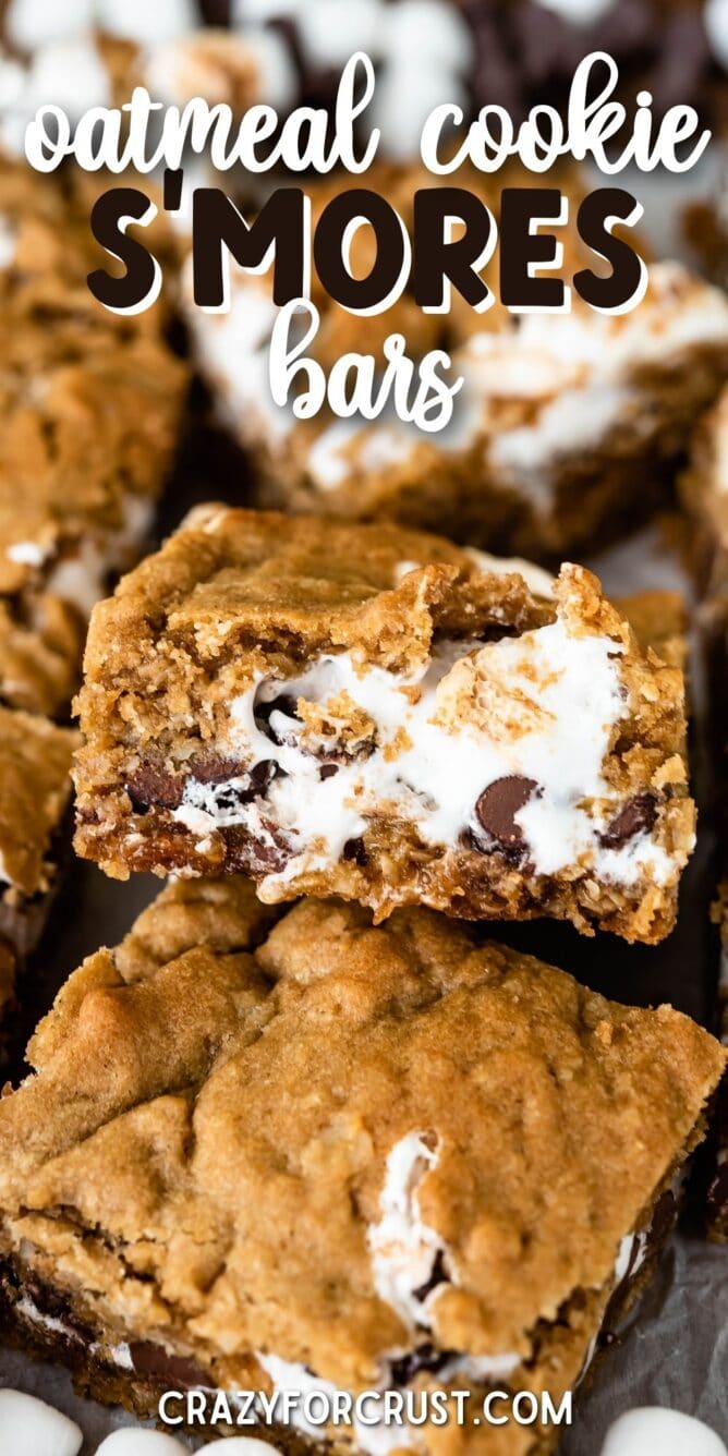 Oatmeal cookie s'mores bars cut into squares with recipe title on top of image