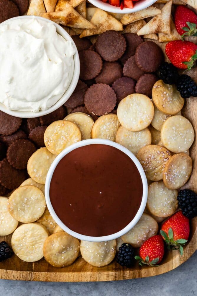 Close up overhead shot of sweet dips and pie crust chips