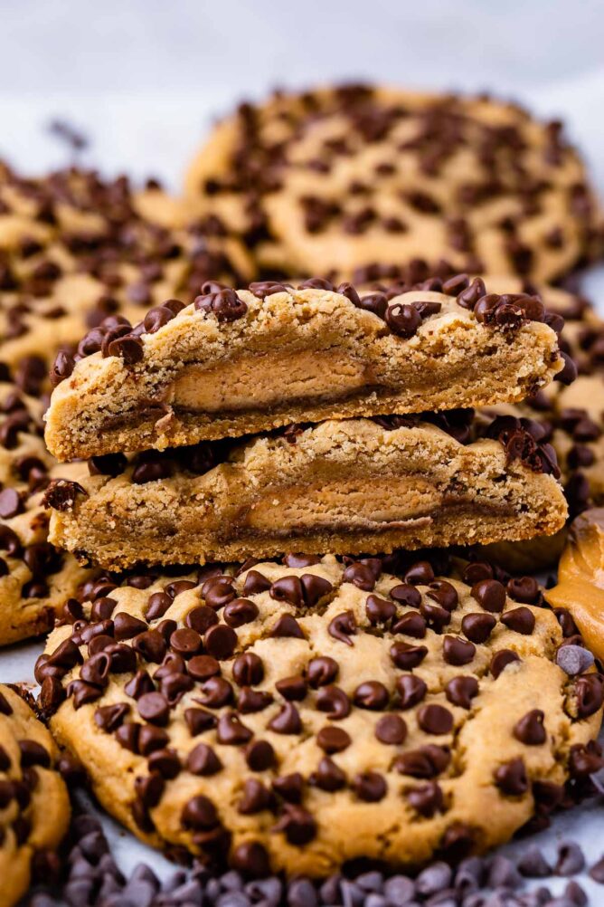 Ultimate stuffed peanut butter cookie split in half to show the inside