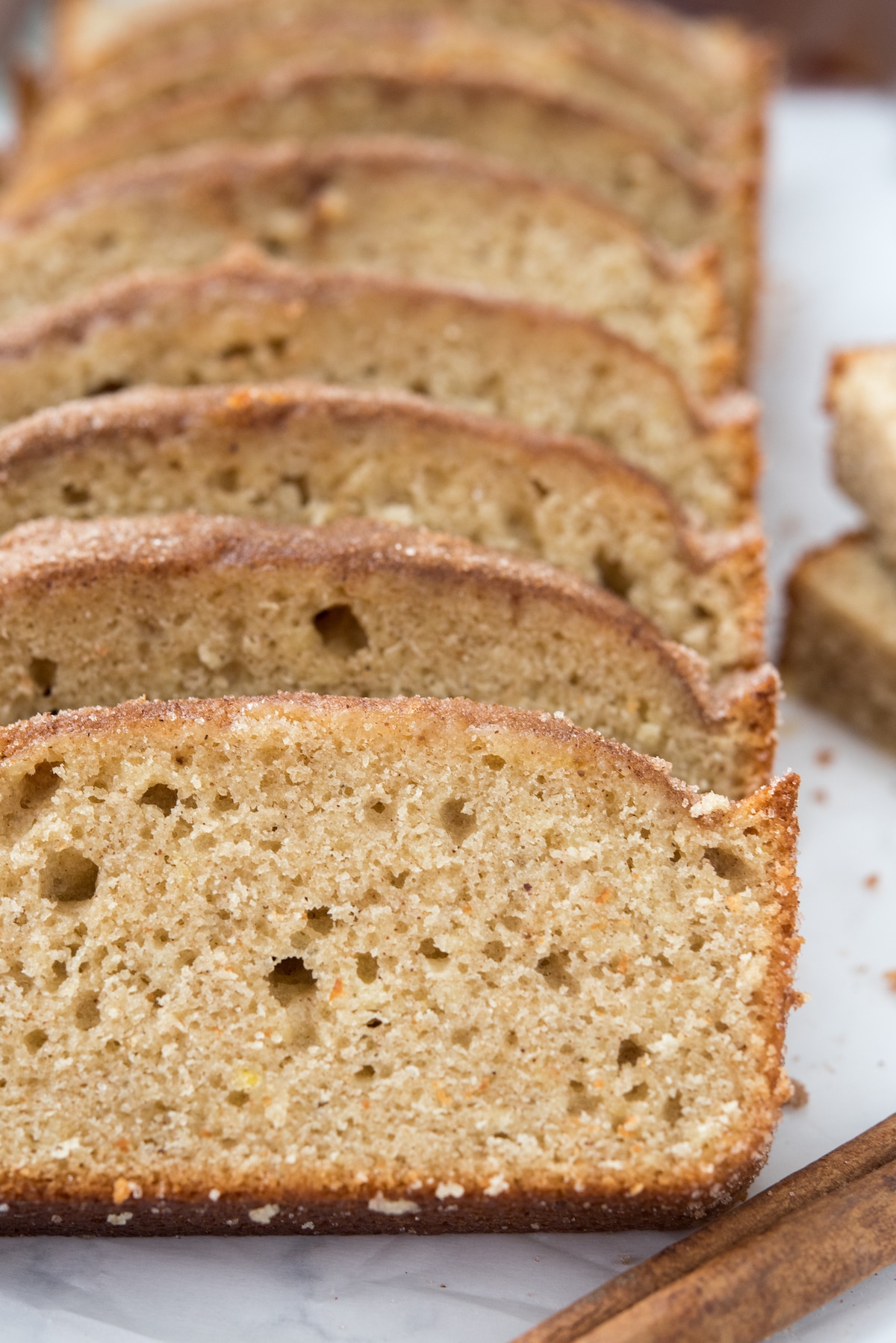 sliced pound cake on a white counter