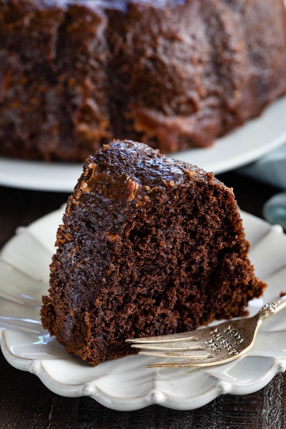 slice of chocolate cake on a white plate