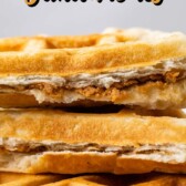 stacked peanut butter waffles with words on the photo