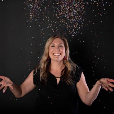 woman throwing sprinkles