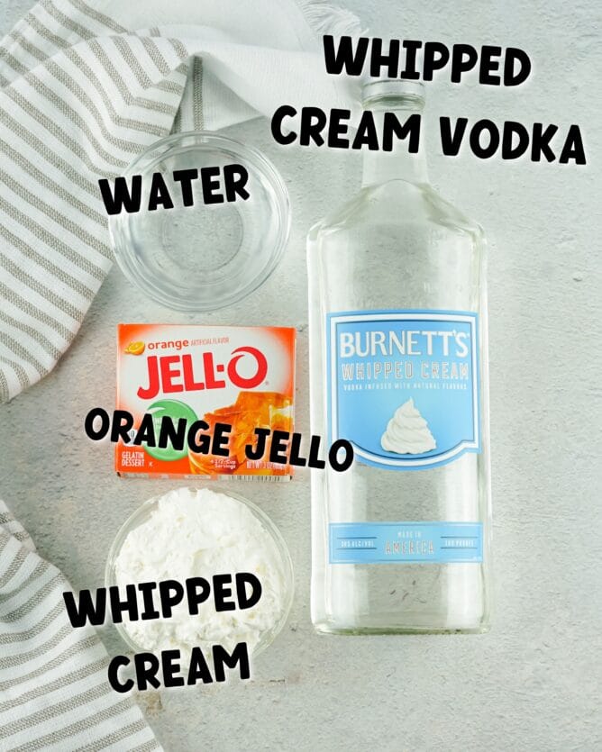 Overhead shot of all ingredients needed to make orange creamsicle jello shots