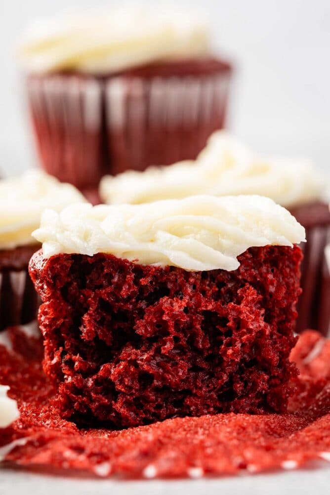 Close up shot of a red velvet cupcake cut in half