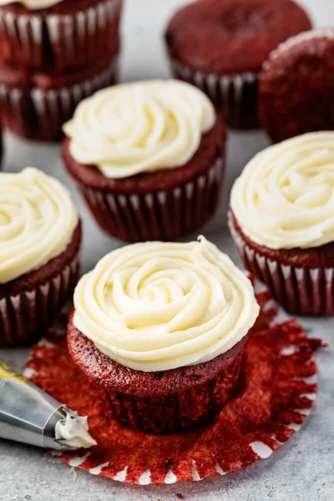 Red velvet cupcakes topped with cream cheese frosting