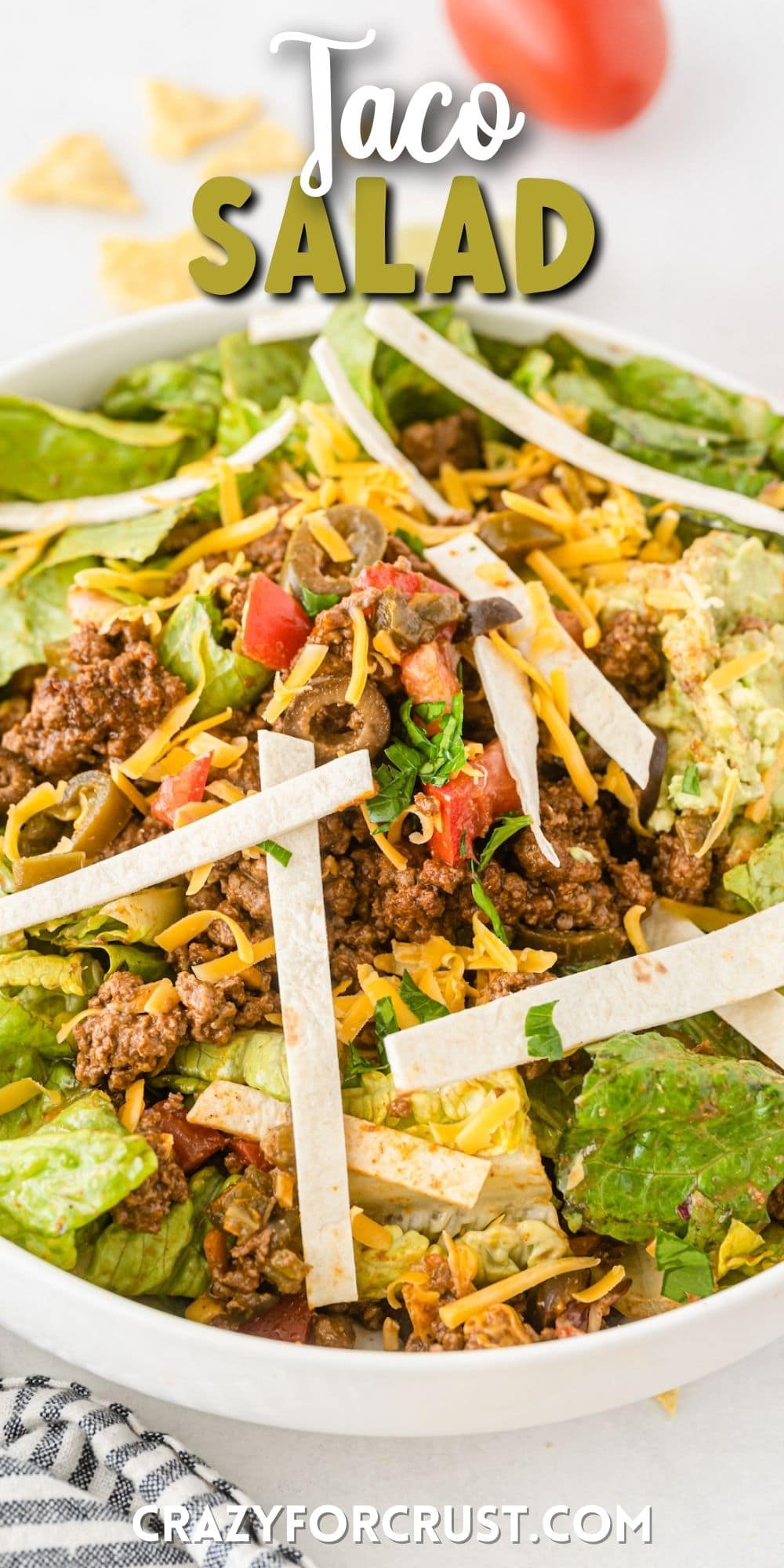 taco salad in bowl with words on photo.