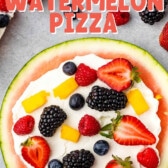 watermelon pizza on grey board with berries around