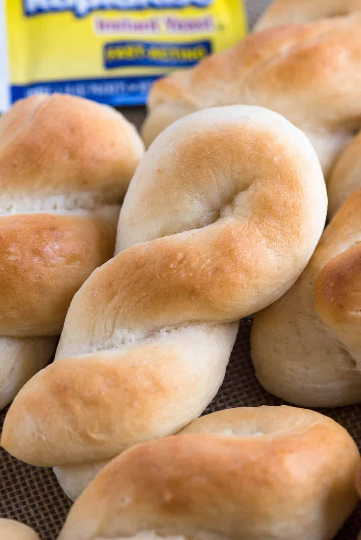 twisted rolls surrounded by other dinner rolls